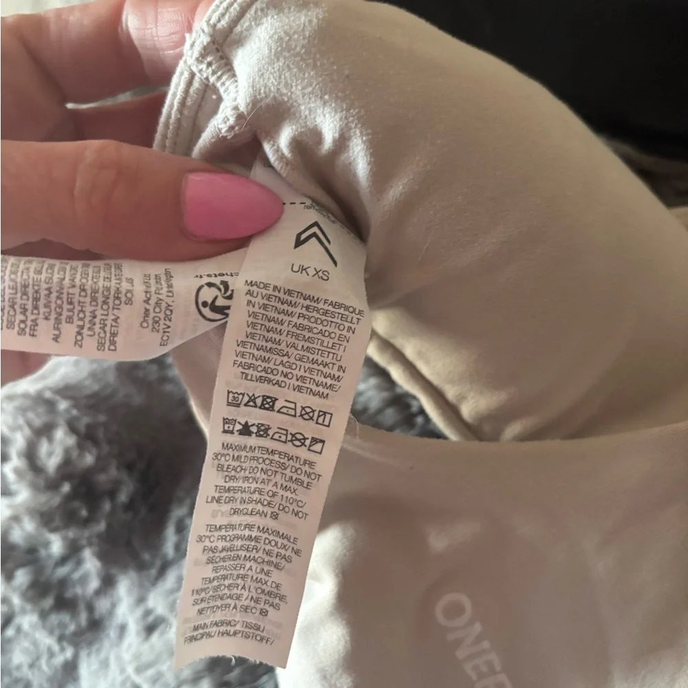 Lot of 3 XS sports bras.  Oner active soft motion and free people. - Picture 7 of 10